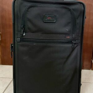 Tumi Black Travel Luggage
